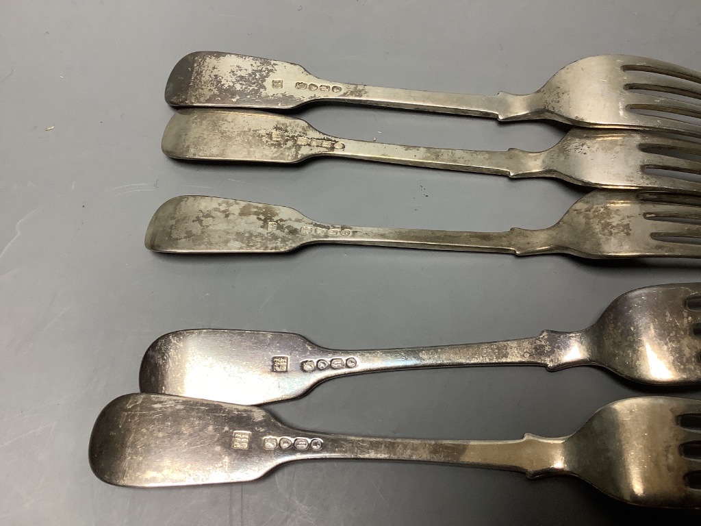 A small collection of silver fiddle pattern flatware, two pairs of sugar tongs and sundry silver coffee and condiment spoons, Georgian and later, approximately 18oz